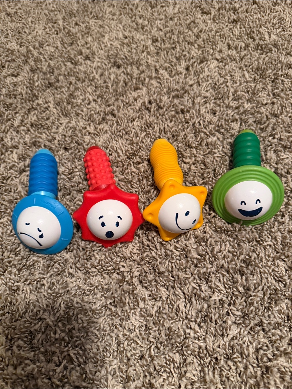 Colorful Smile Sensory Rattle Set - Blue, Red, Yellow, Green